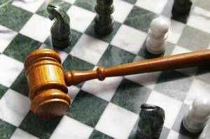 Gavel on chess board - SEC whistleblower lawyer