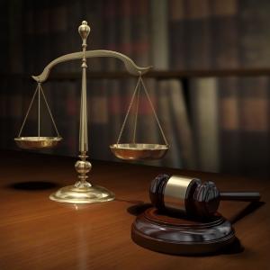 Scale and gavel on desk